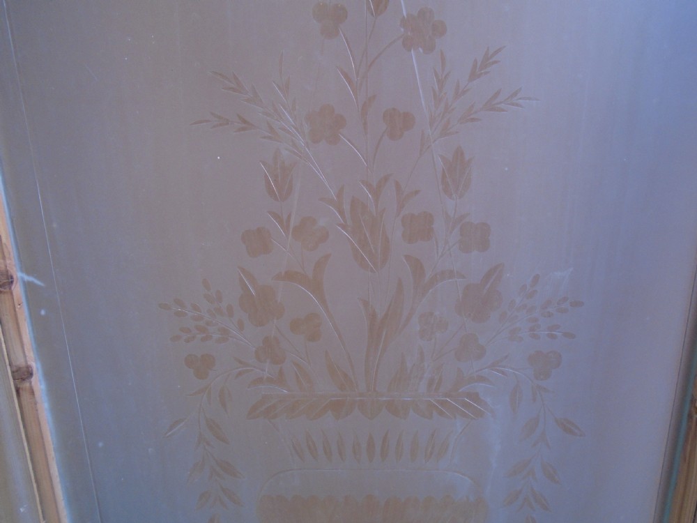 A stripped pine Victorian internal door featuring a large upper etched glass panel depicting an urn motif and a single timber panel below. View IX