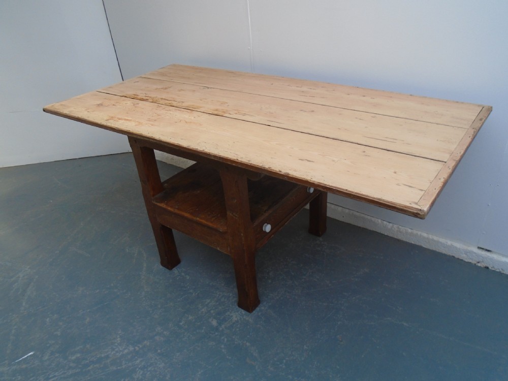A Georgian pine chair-table featuring an armchair base with an under-seat drawer and an upright hinged timber backrest. View VIII