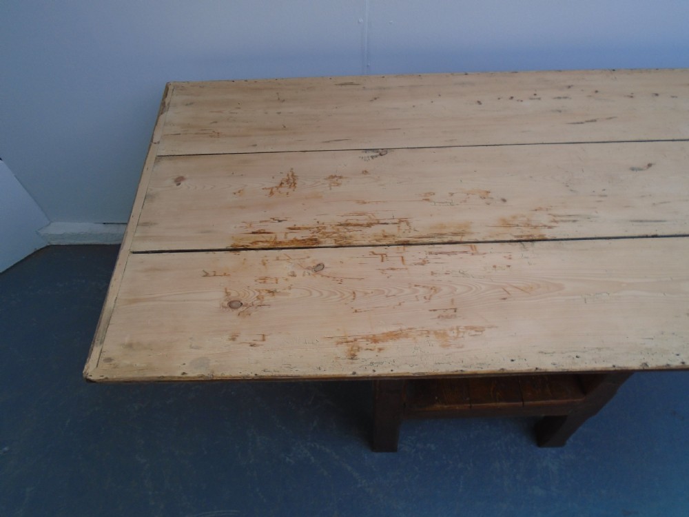 A Georgian pine chair-table featuring an armchair base with an under-seat drawer and an upright hinged timber backrest. View IX