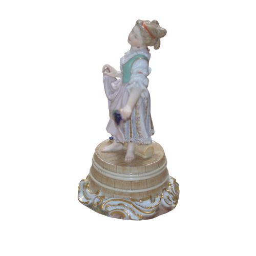 MEISSEN PORCELAIN FIGURE OF A GIRL HOLDING GRAPES