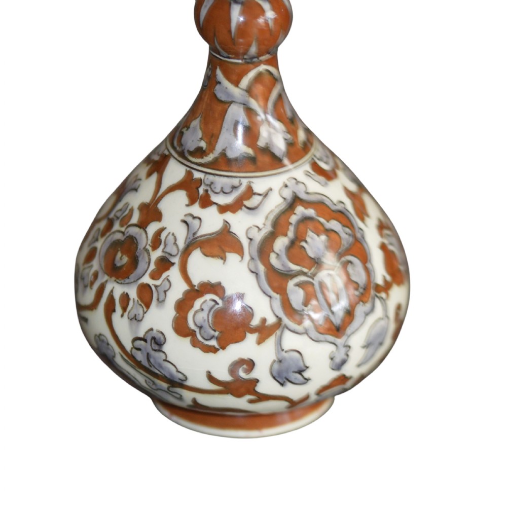 An antique Art Nouveau earthenware vase with a bulbous body, a narrow neck with a central knop, and hand-painted terracotta and grey foliage motifs. View III