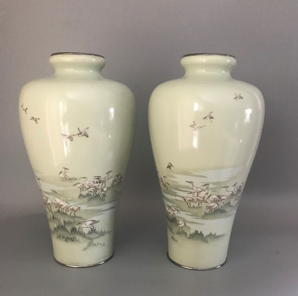 An important pair of antique Japanese Cloisonne vases.