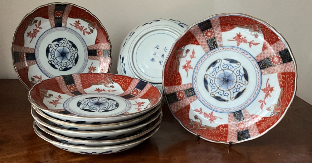Set of 8 Japanese Imari dishes .