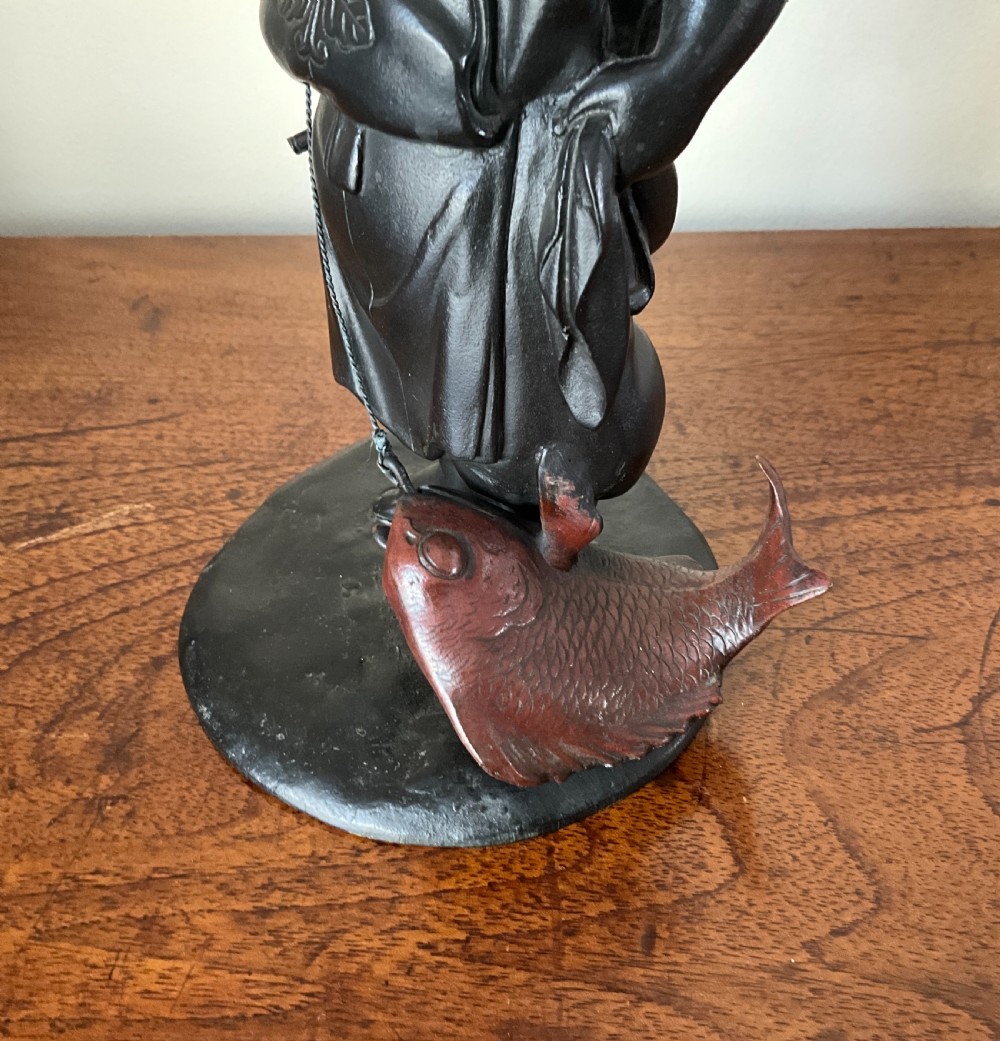 Japanese bronze okimono of Ebisu . View IV