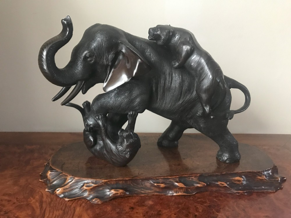 JAPANESE BRONZE OF AN ELEPHANT AND TIGERS