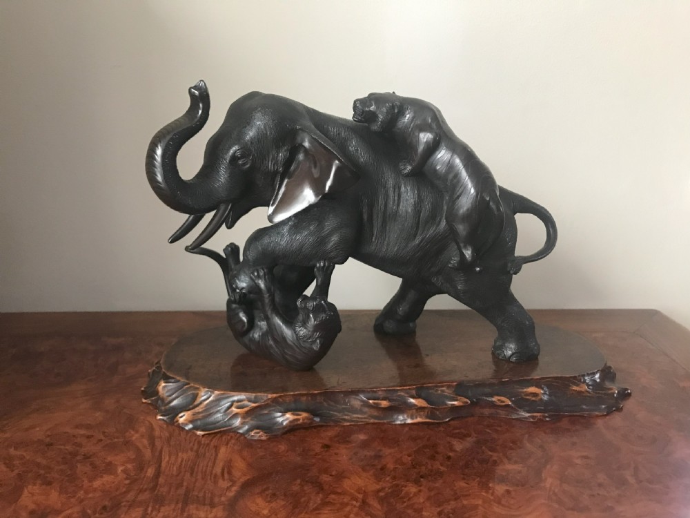 JAPANESE BRONZE OF AN ELEPHANT AND TIGERS View IV