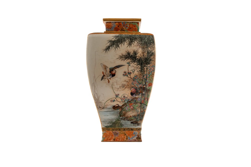 A Japanese Satsuma earthenware vase featuring hand-painted mandarin ducks, bamboo, and detailed gilded borders on a cream crackle-glazed surface.