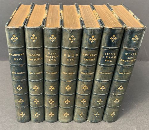 fig 1. 7 book set of Novels and Tales by Mrs Gaskell dated 1893-1900 and bound by Riviere