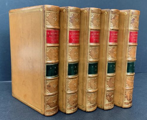 fig 1. Leather bound 5 book set of the Poetical Works of Elizabeth Barrett Browning dated 1886