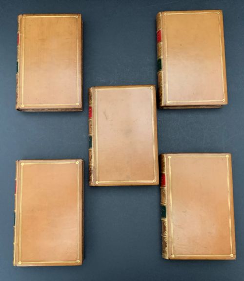 fig 2. Leather bound 5 book set of the Poetical Works of Elizabeth Barrett Browning dated 1886