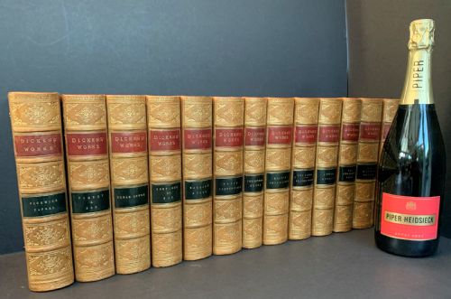 fig 1. 13 handsomely bound books by Charles Dickens circa 1880