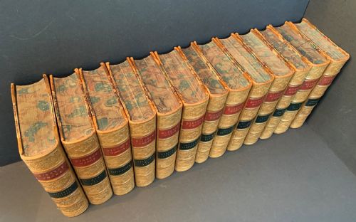 fig 2. 13 handsomely bound books by Charles Dickens circa 1880