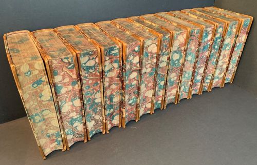 fig 3. 13 handsomely bound books by Charles Dickens circa 1880