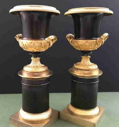 A fine and elegant pair of English Regency period bronze and ormolu campana form urns circa 1820