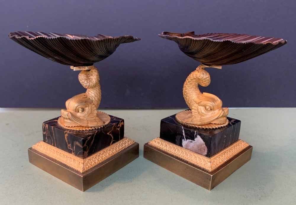 A very fine pair of Regency period bronze and gilt bronze tazze in the manner of Thomas Messenger.