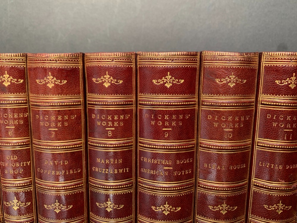 13 uniformly bound books by Charles Dickens circa 1880 View III