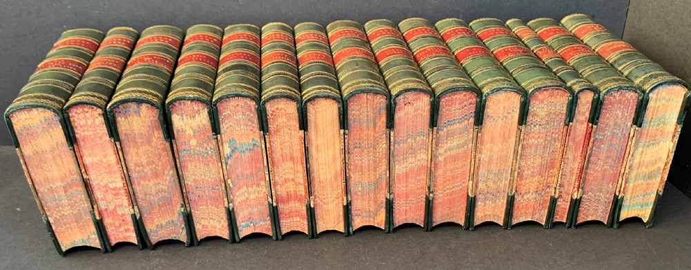 Forster's Life of Dickens, 13 of Dicken's novels and some of his short stories contained in 15 uniformly bound books 1867-1875 View V