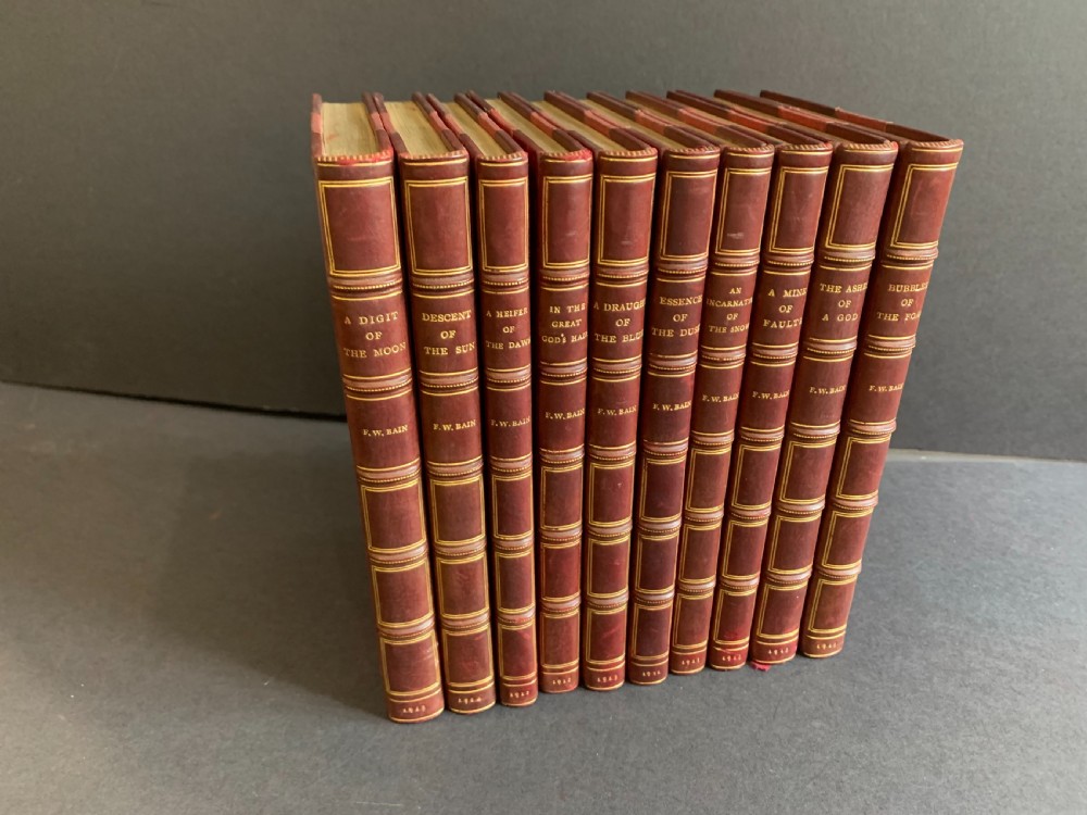 An attractively bound set of books comprising the first 10 Indian Stories of F W Bain dated 1911-1914 View II