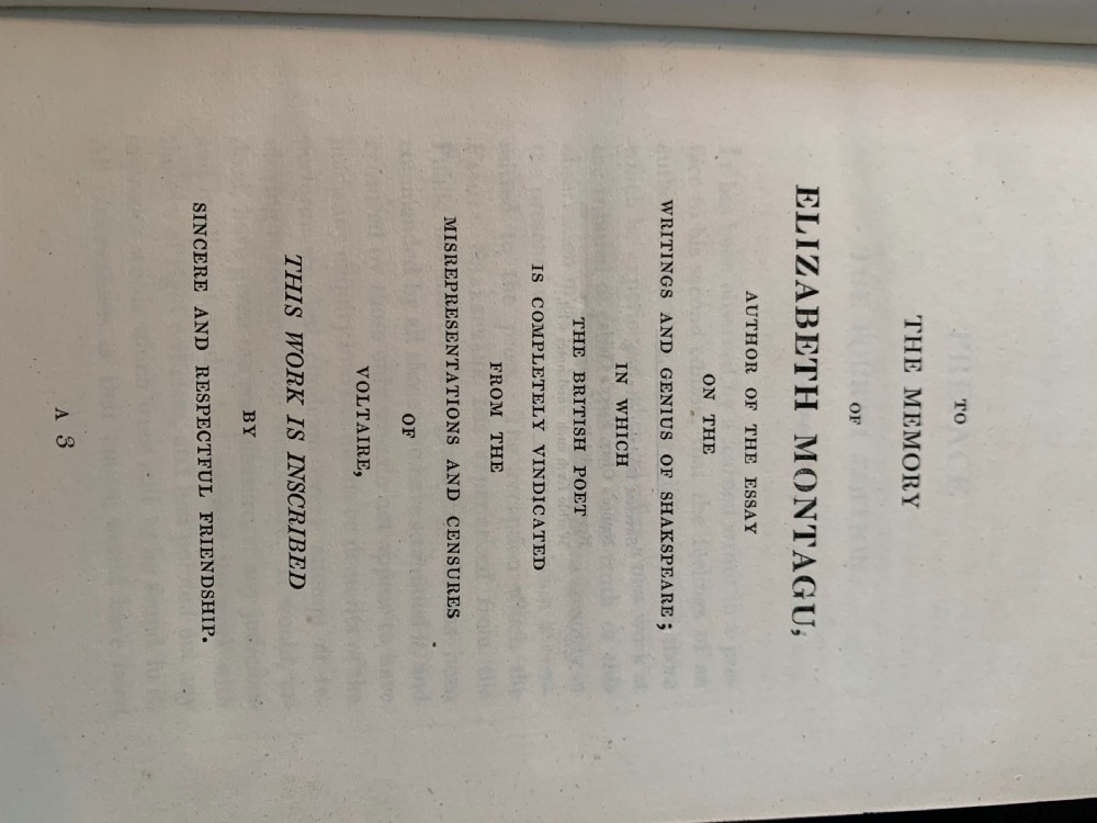 An eight-volume set of 1827 leather-bound books titled Bowdlers Family Shakspeare with red leather spines, raised bands, and gilt decoration. View XII