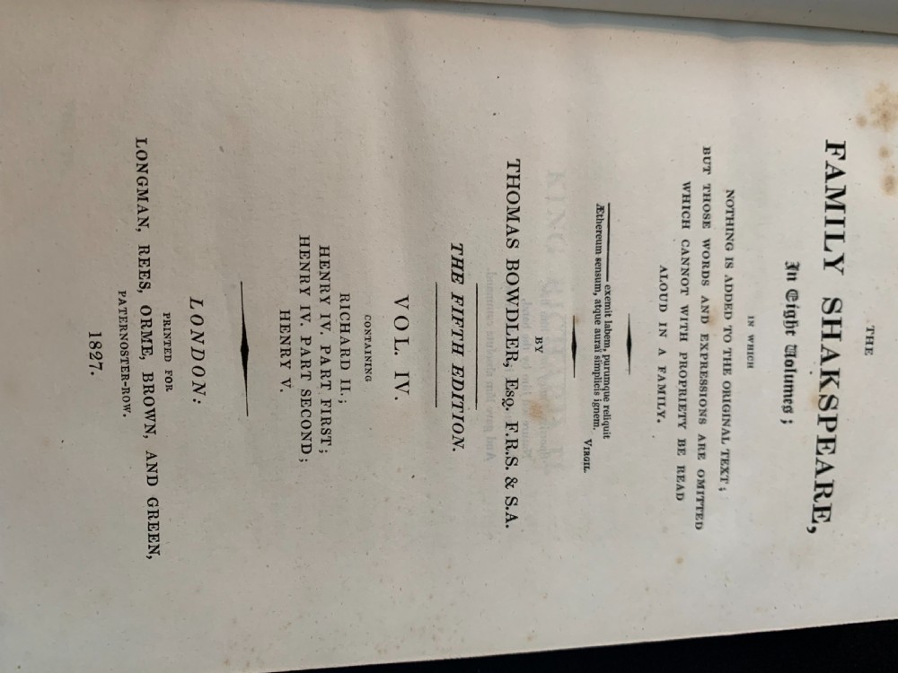 An eight-volume set of 1827 leather-bound books titled Bowdlers Family Shakspeare with red leather spines, raised bands, and gilt decoration. View XVI