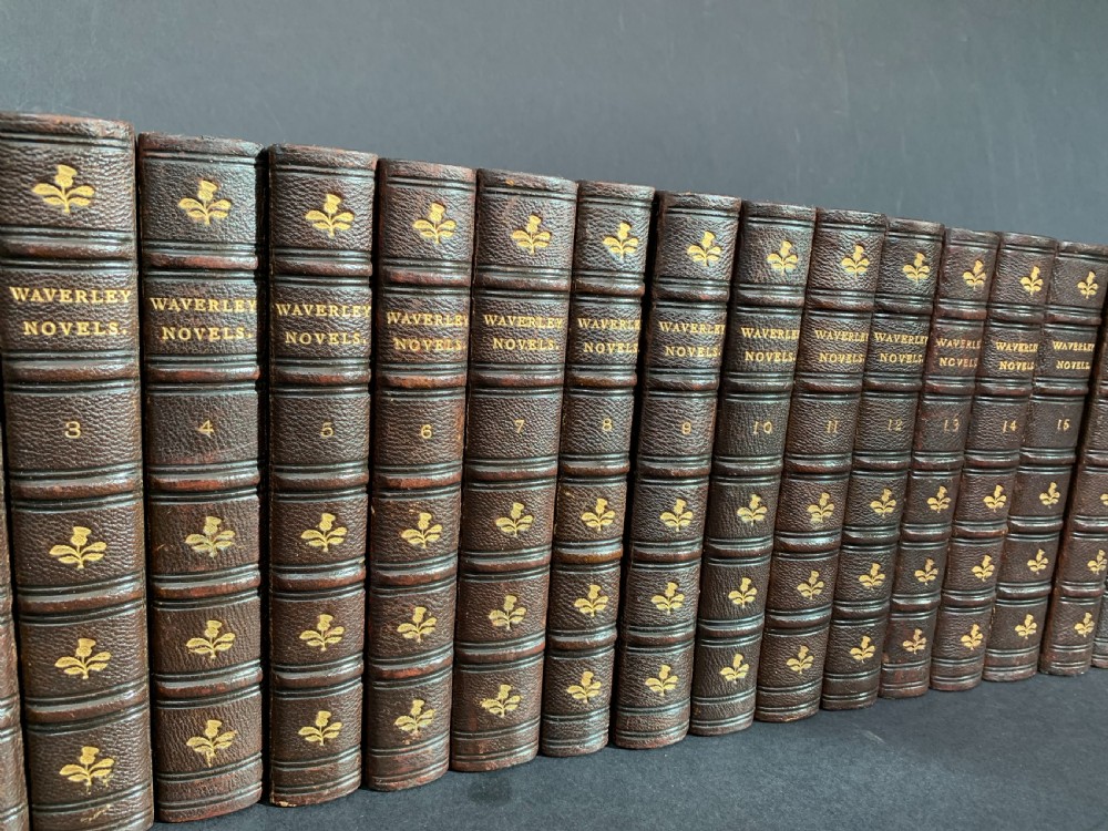 24 uniformly bound books of a 25 volume set of Sir Walter Scott's Waverley Novels dated 1873-1874 View II