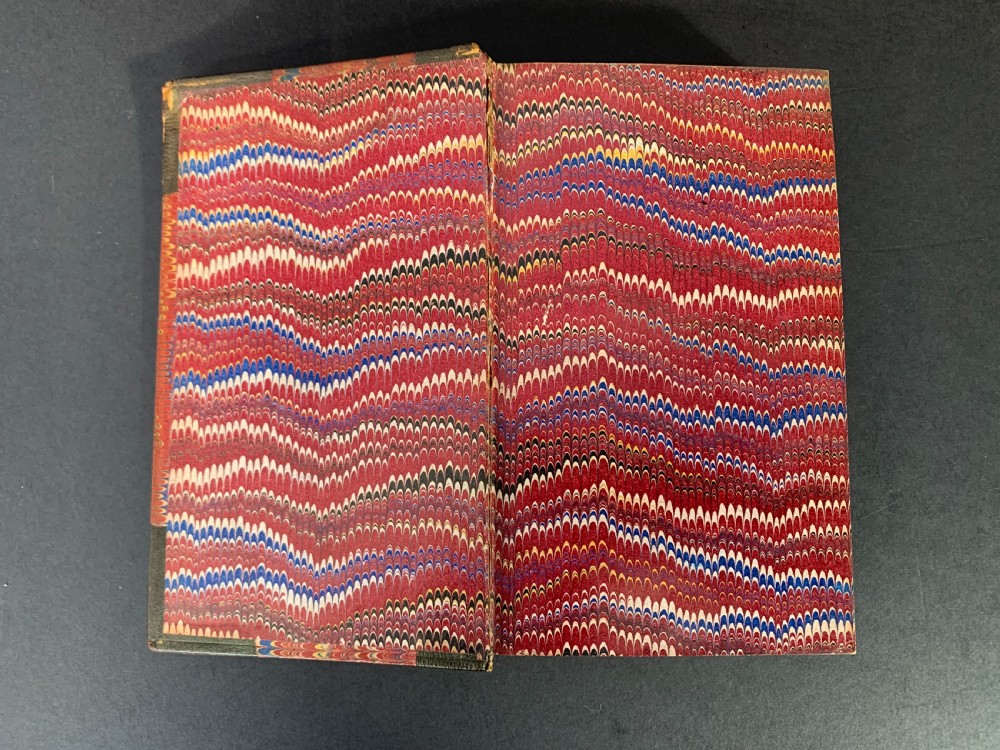 24 uniformly bound books of a 25 volume set of Sir Walter Scott's Waverley Novels dated 1873-1874 View IV