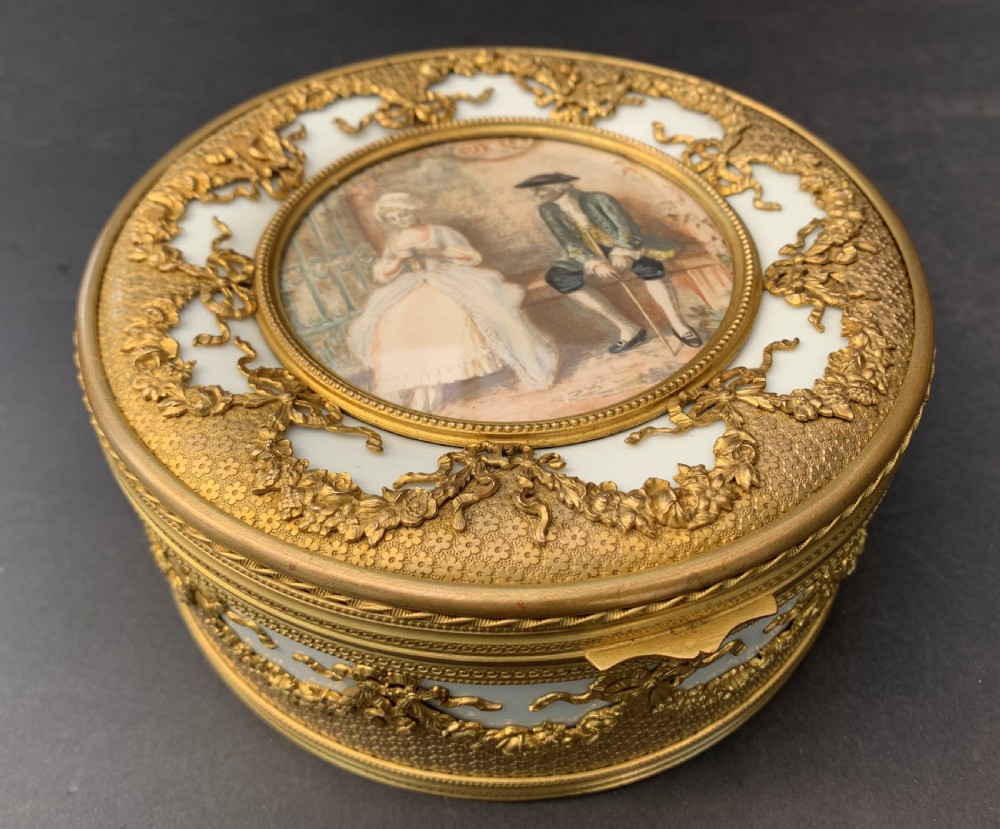 Charming good quality late 19th century French ormolu mounted glazed white porcelain casket or jewellery box