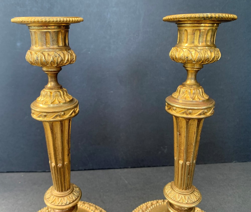 Smart pair of circa 1870 French gilt bronze candlesticks in the Louis XVI manner View II