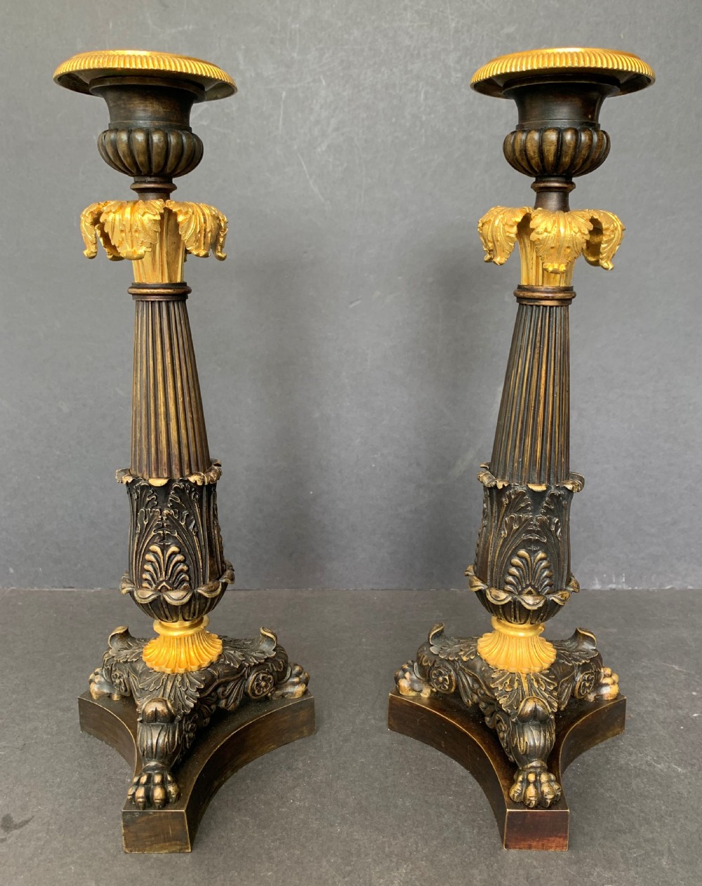 Pair of well cast bronze and ormolu French Restauration period candlesticks circa 1820