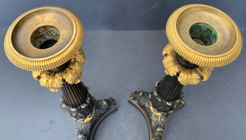 Pair of well cast bronze and ormolu French Restauration period candlesticks circa 1820 View II