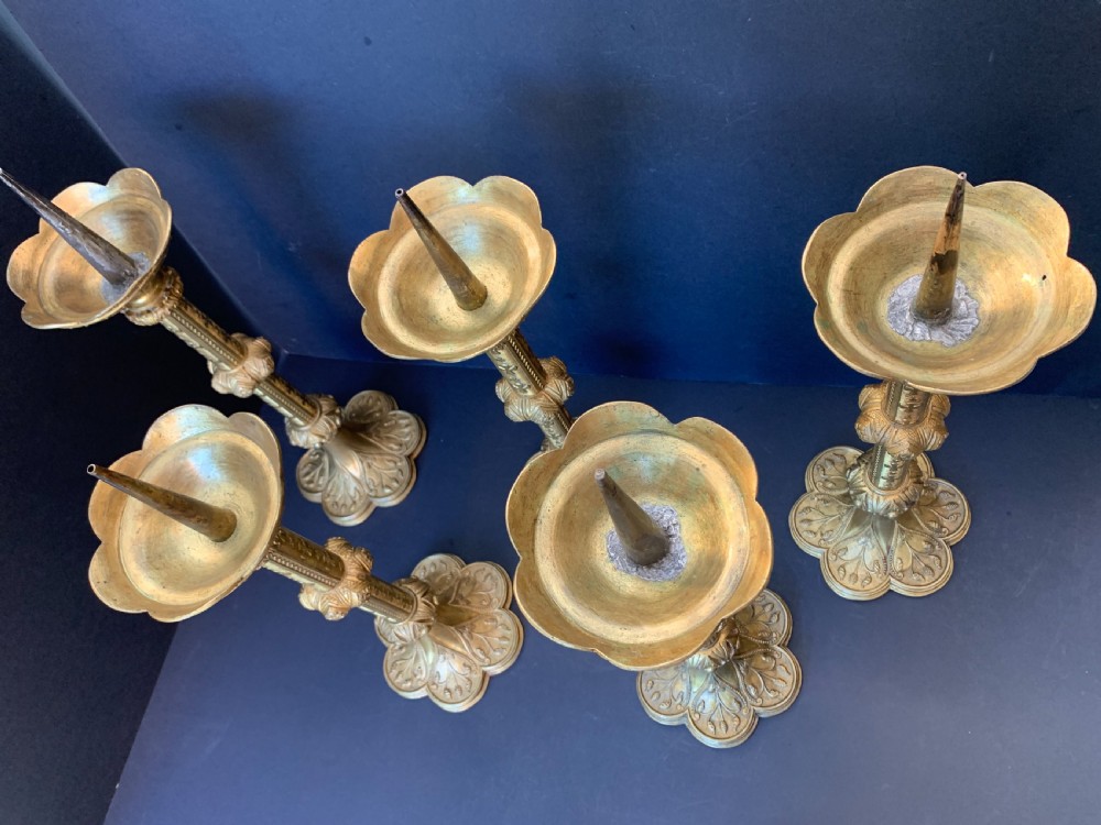 A scarce late 19th century set of 5 ormolu ecclesiastical pricket candlesticks  View VI