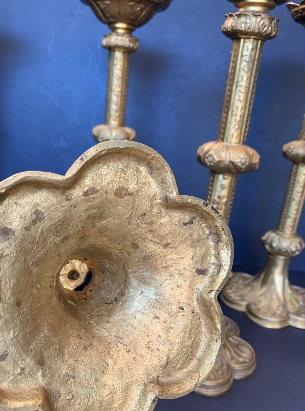 A scarce late 19th century set of 5 ormolu ecclesiastical pricket candlesticks  View VII
