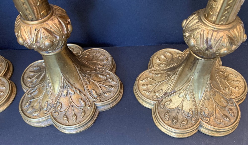 A scarce late 19th century set of 5 ormolu ecclesiastical pricket candlesticks  View IX