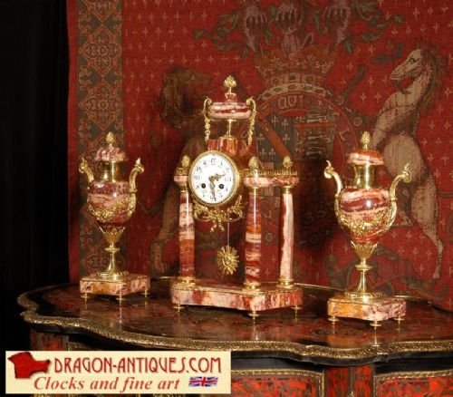 Red Marble and Ormolu Portico Clock Set
 by Fritz Marti 
