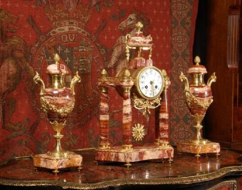 fig 1. Red Marble and Ormolu Portico Clock Set
 by Fritz Marti 
