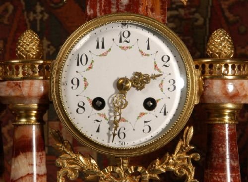 fig 3. Red Marble and Ormolu Portico Clock Set
 by Fritz Marti 
