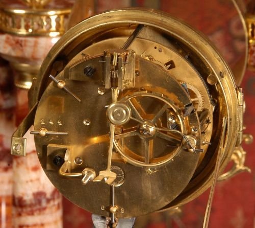 fig 4. Red Marble and Ormolu Portico Clock Set
 by Fritz Marti 
