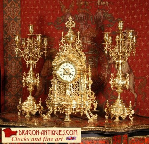 Large and Stunning Gilt Brass Clock Set
by A. D. Mougin.