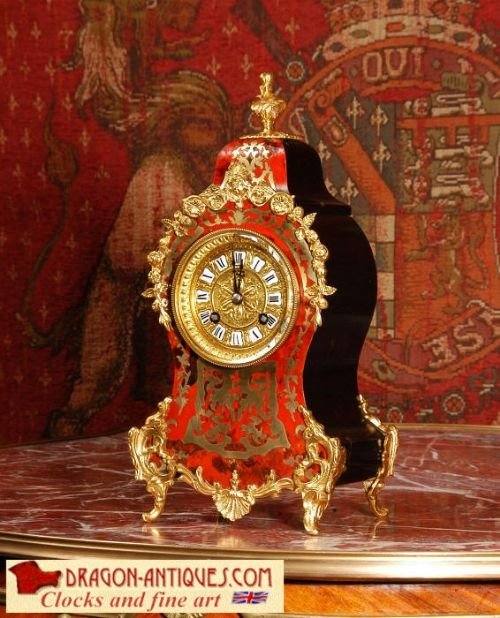 Antique French Boulle Boudoir Clock
by Samuel Marti. 
