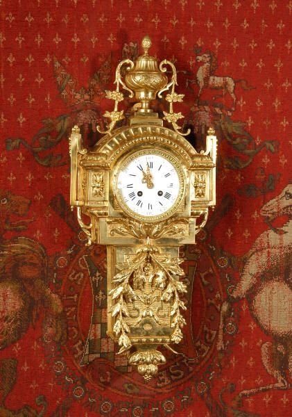 fig 1. Antique French Gilt Brass Cartel Wall Clock
by Samuel Marti. 
