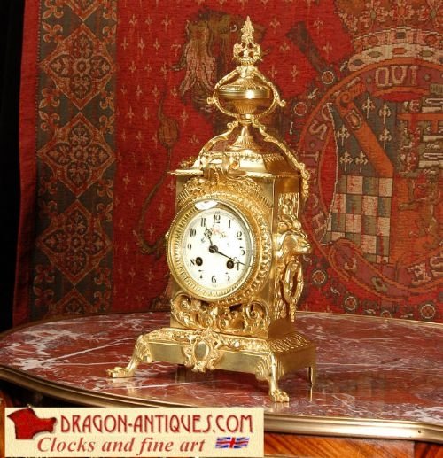 Antique French Brass Table Clock
by Fritz Marti.