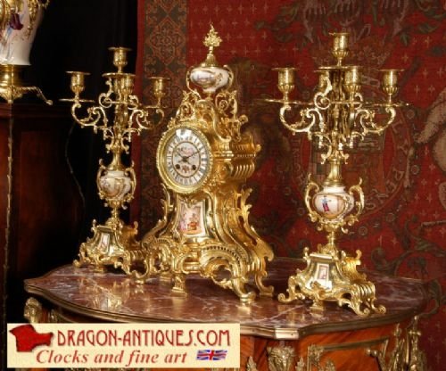 Stunning Sevres Porcelain and Gilt Brass Clock Set.