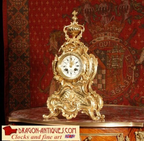 Antique French Rococo Boudoir Clock
by A.d. Mougin
