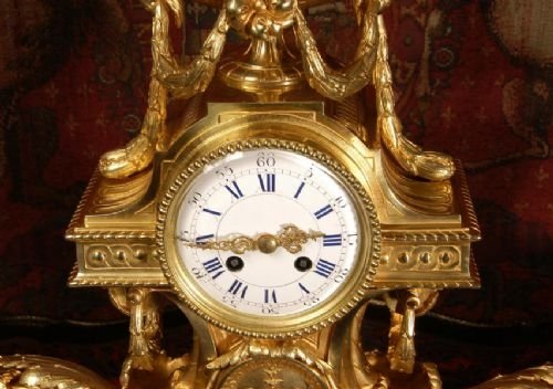 fig 4. Magnificent Antique French Ormolu Clock Set
by Samuel Marti.