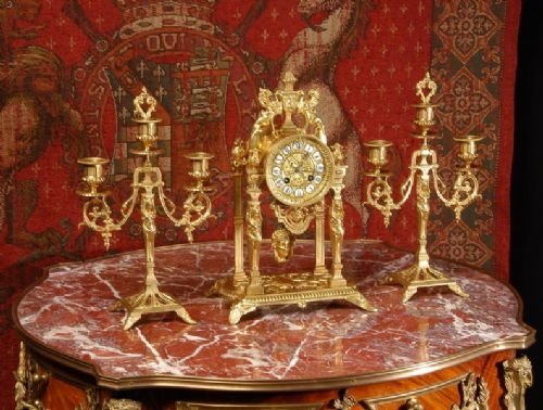 fig 1. Antique French Gilt Brass Portico Clock Set.