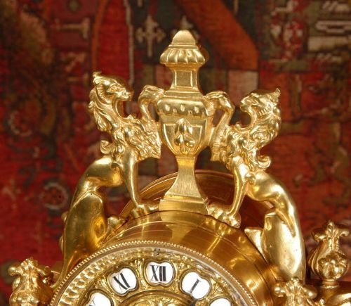 fig 4. Antique French Gilt Brass Portico Clock Set.