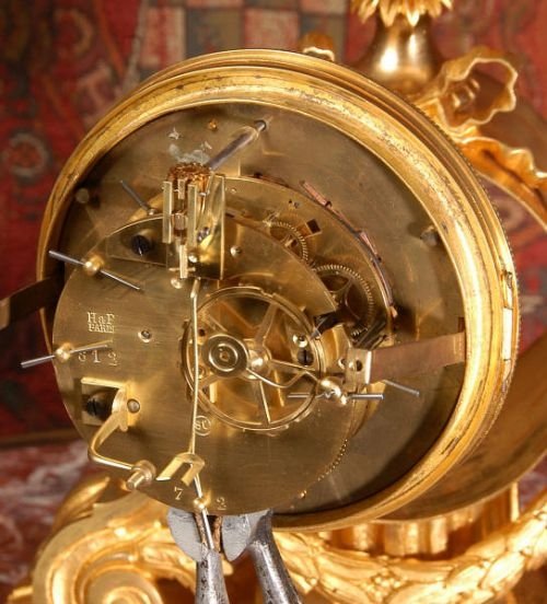 fig 4. Antique French Ormolu Neoclassical Drum Head Clock.