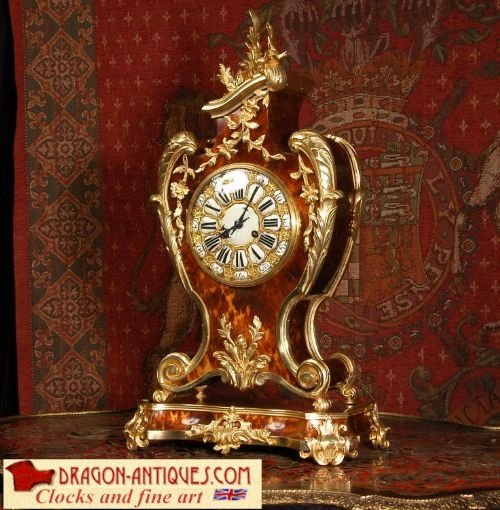 Magnificent Ormolu and Veneer Antique French Table Clock
by Vincenti Et Cie.
