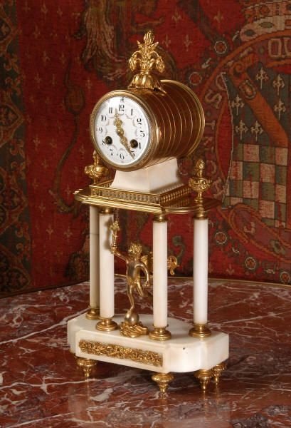 fig 1. Ormolu and White Marble Antique French Boudoir Portico Clock
by A. D. Mougin. 