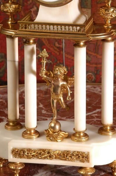 fig 2. Ormolu and White Marble Antique French Boudoir Portico Clock
by A. D. Mougin. 